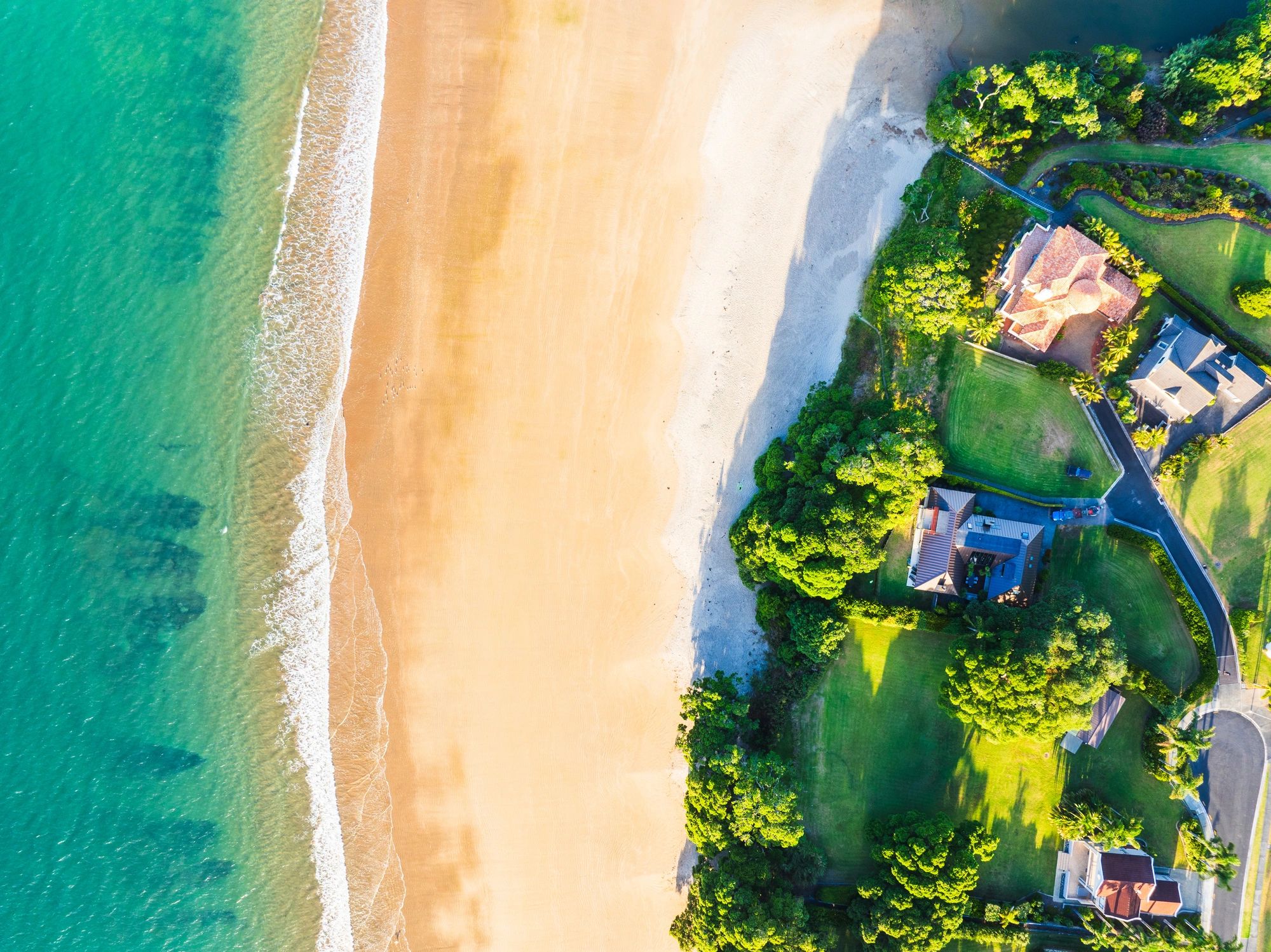 Aerial view of gated luxury community beach