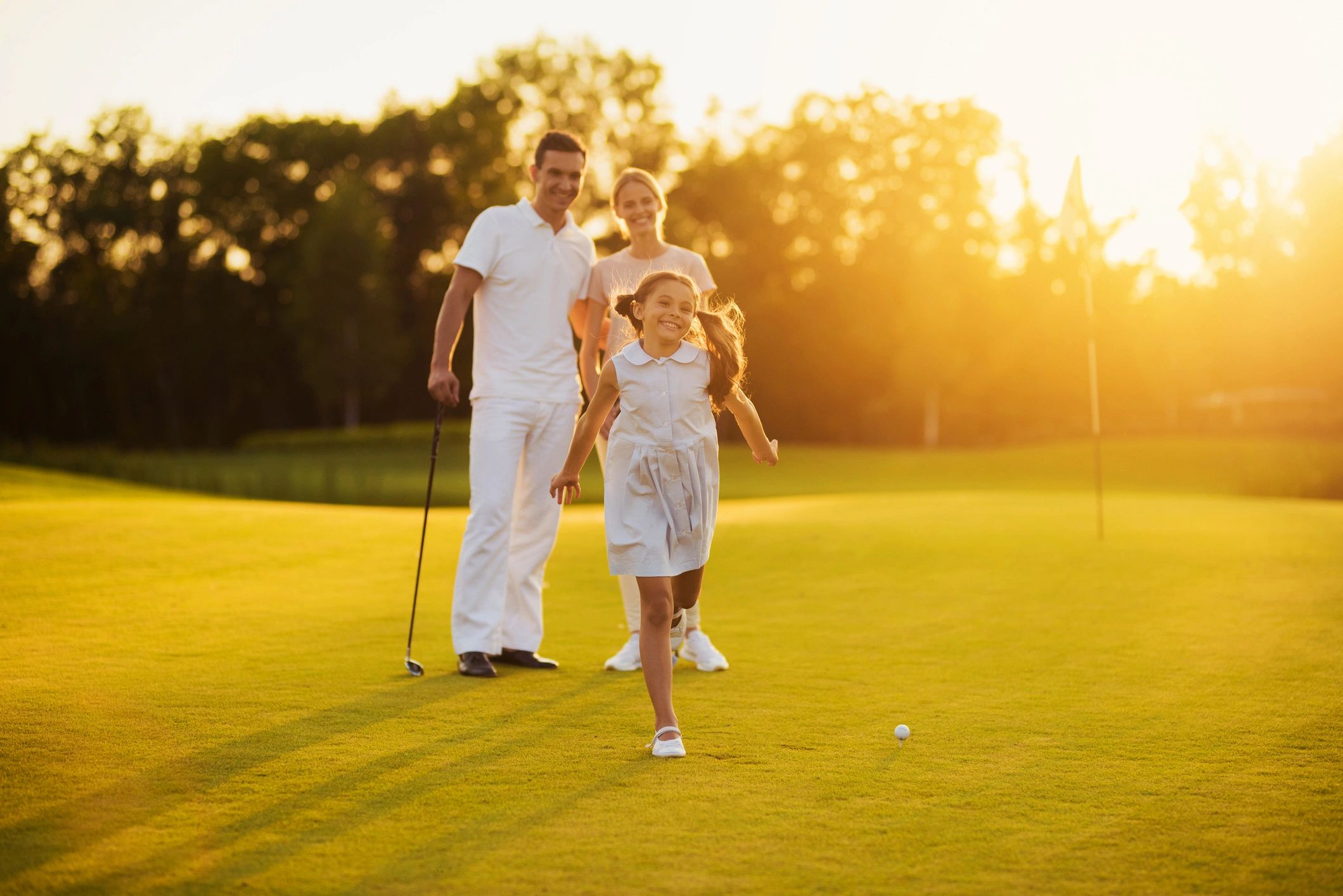family enjoying golf resort